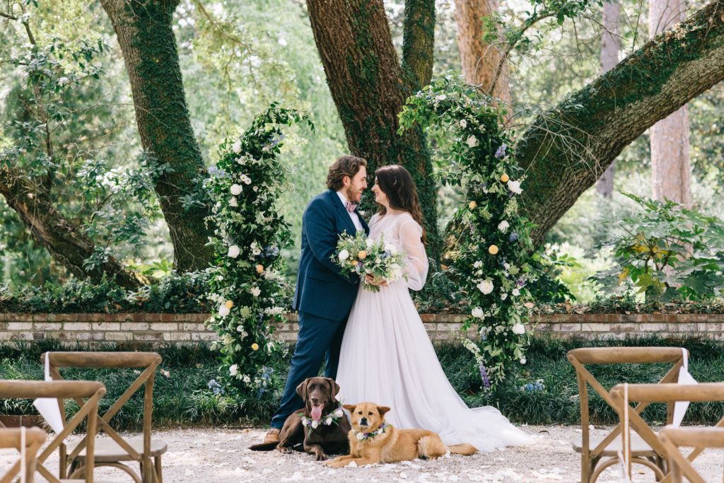 Bride and groom photographed with dogs on wedding day. Aiken SC Wedding Photography 