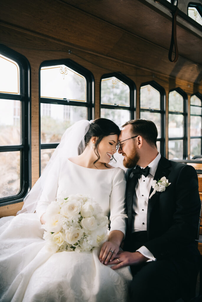 bride and groom on trolley before wedding ceremony in Aiken, SC