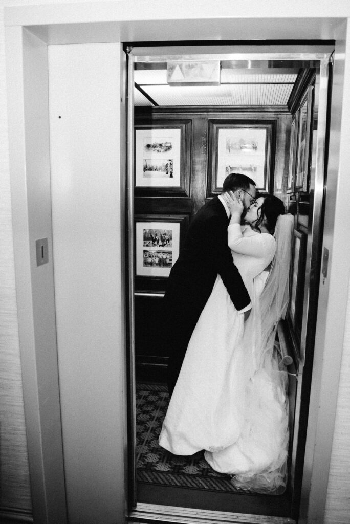 bride and groom intimate elevator kiss at the willcox wedding Aiken SC